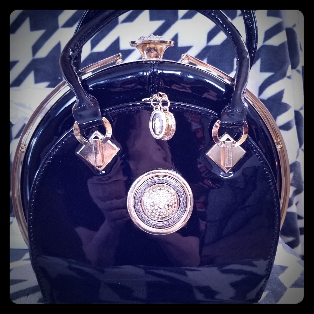 Black patent leather handbag